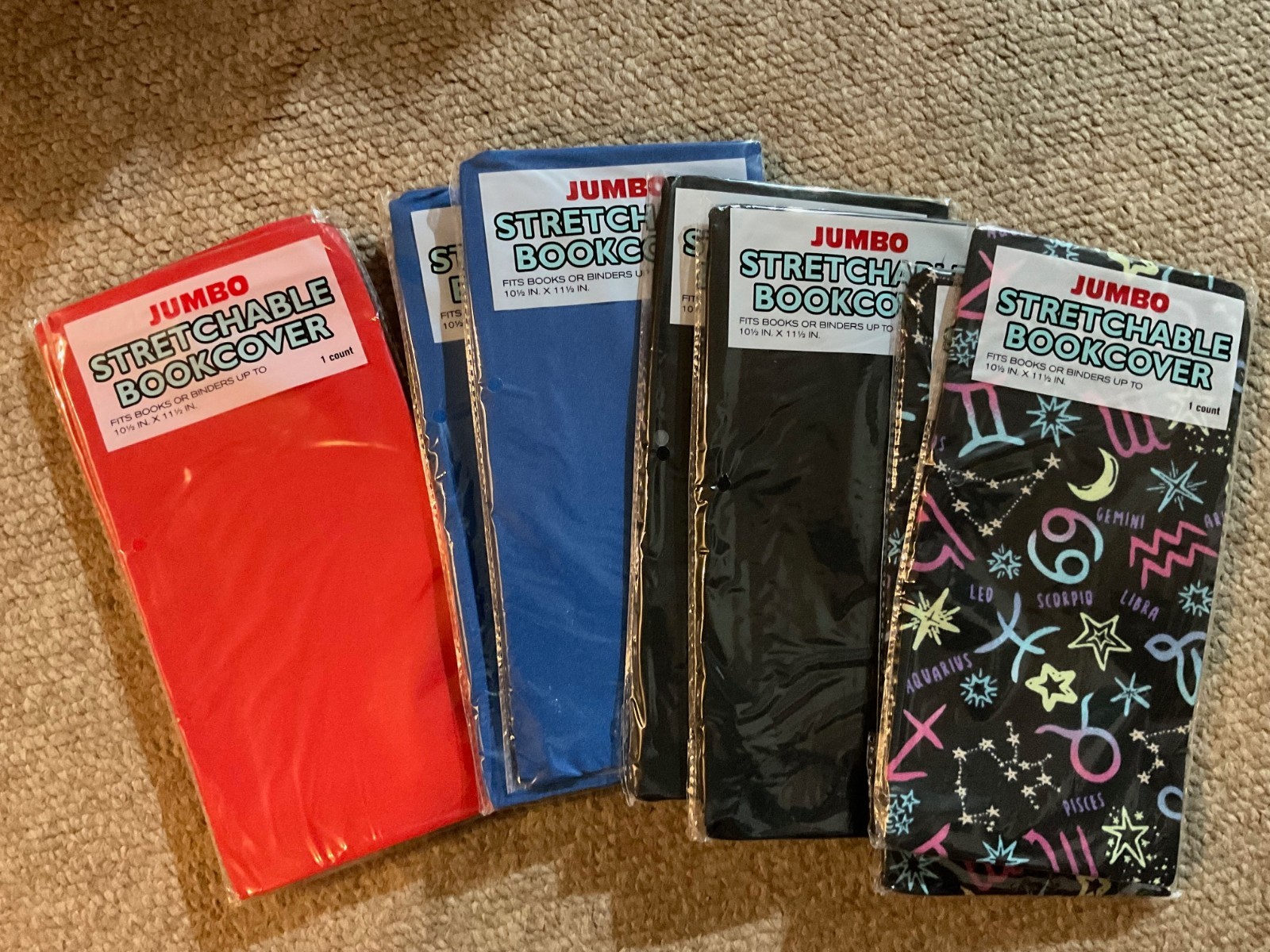 8 NEW stretchable jumbo textbook  book or binder covers . washable reusable