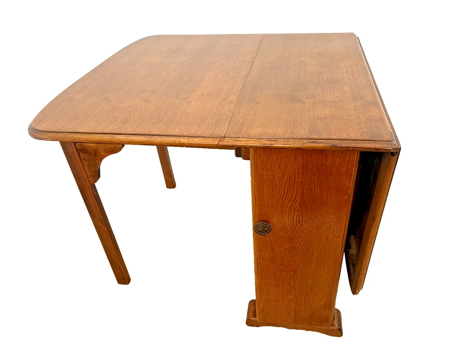 Mesa con patas de puerta vintage laterales desplegables dos cajones y armario rectangular roble Foto 3 de 4