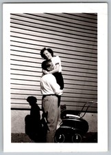 Vtg B W Snapshot Happy Couple Man Holding Woman By Vintage Baby Carriage 1950s