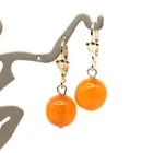 Earrings with antique egg yolk colored pressed amber beads