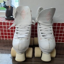 Pattini a rotelle Oxelo bianchi e rosa quad taglia UK 2,5 buone condizioni pattini