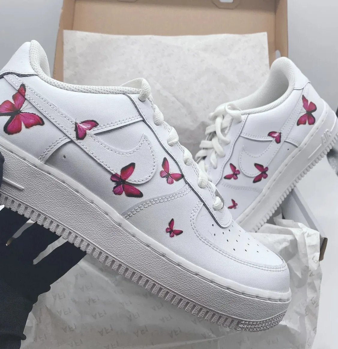 white nike butterfly shoes