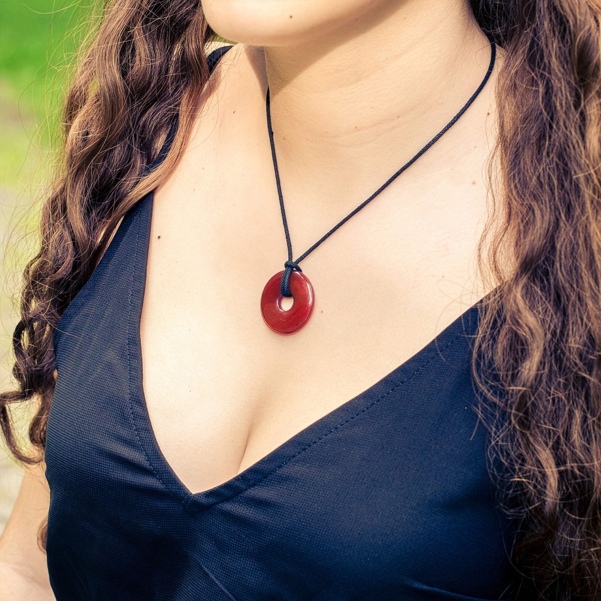Karneol Donut Anhänger 30 mm mit Baumwollband