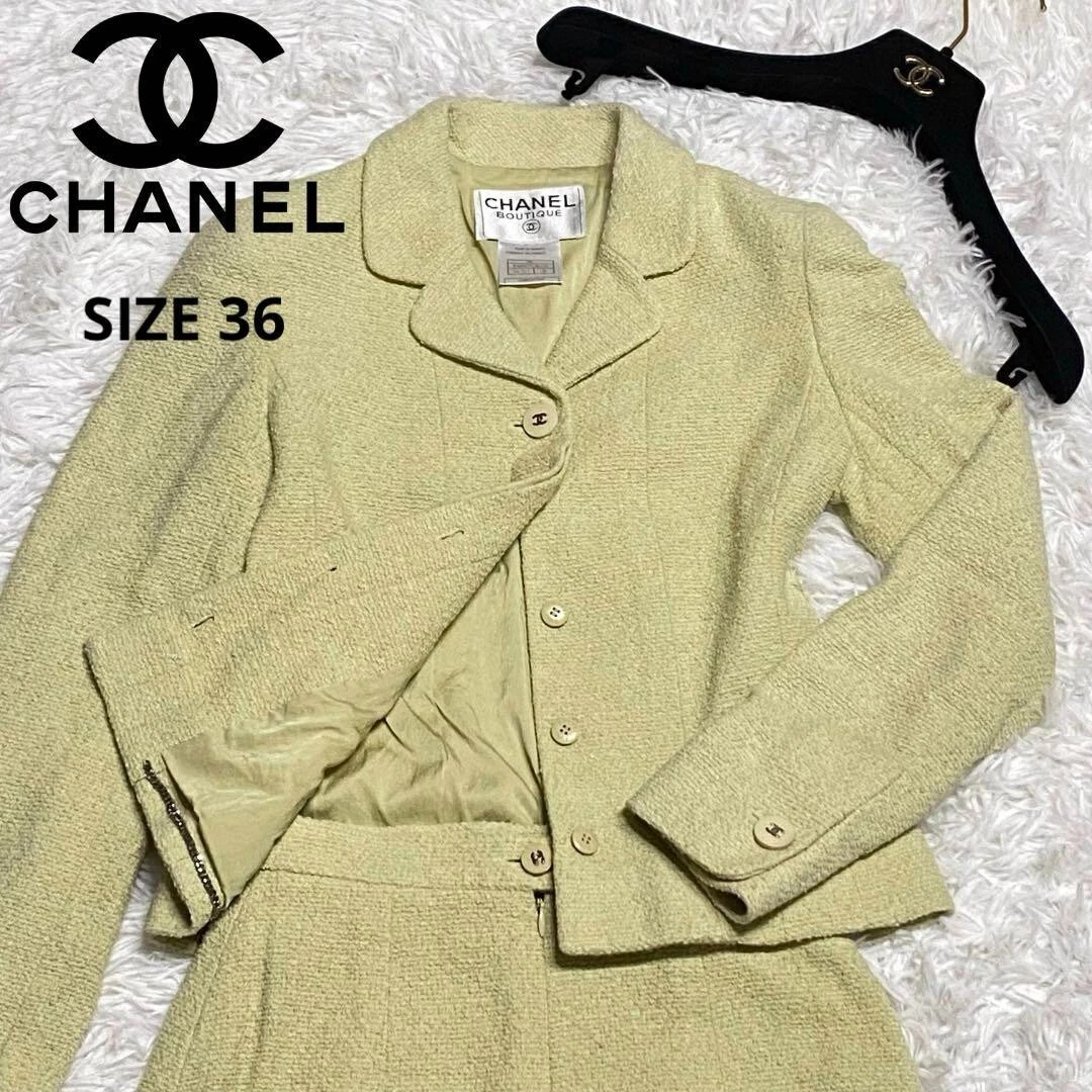 Set giacca e gonna CHANEL 98C tweed marchio cocco taglia 36 giallo beige vintage