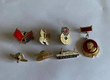 Collection of 7 Pins and Medals Featuring Lenin, American Flags, Naval and Milit