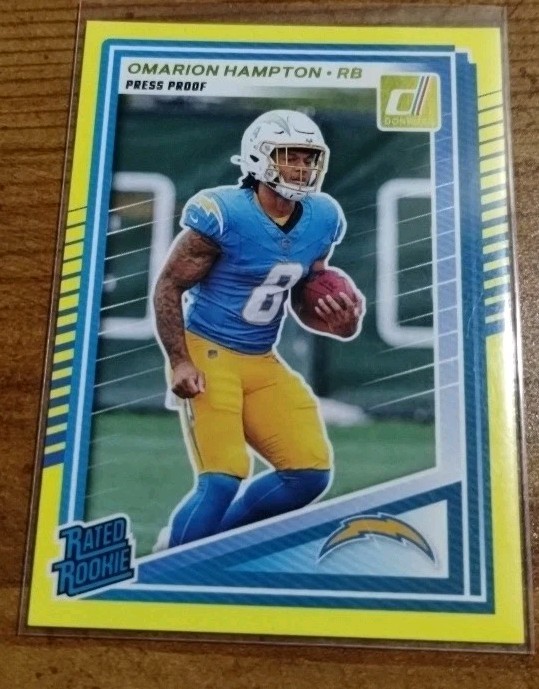2025 Panini Donruss Rated Rookie Press Proof Yellow Omarion Hampton RC #303