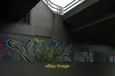Photo 6x4 View of graffiti under the A406 bridge in Roding Valley Park #1 c2017