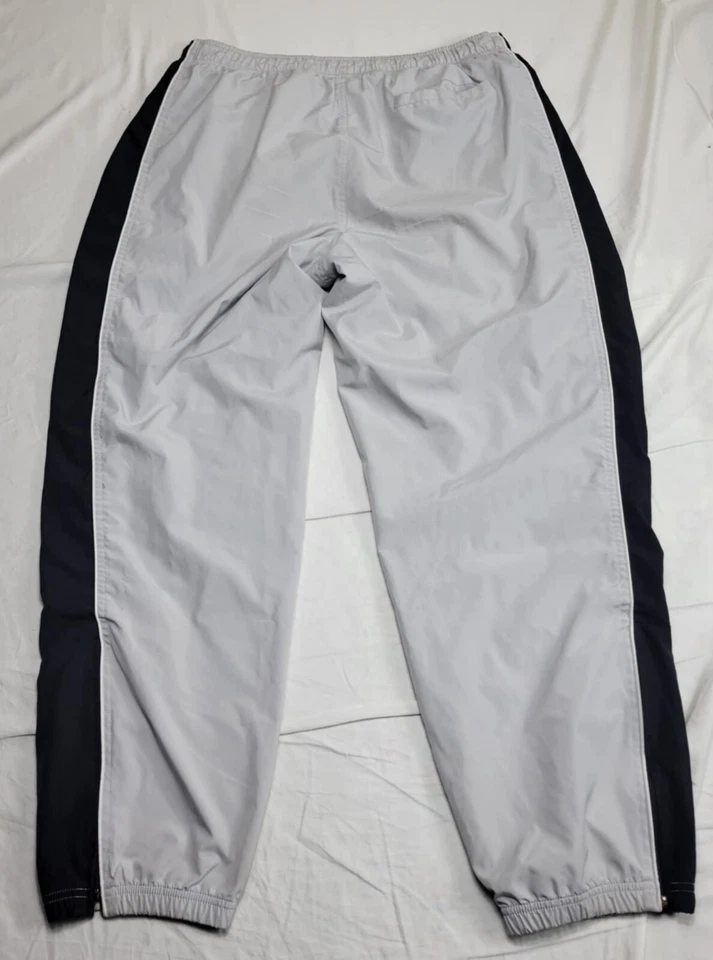 Pantalones deportivos Reebok para hombre talla grande forrados negros grises Foto 2 de 4