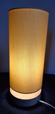 Lamp with yellow shade , wooden base and rocker switch