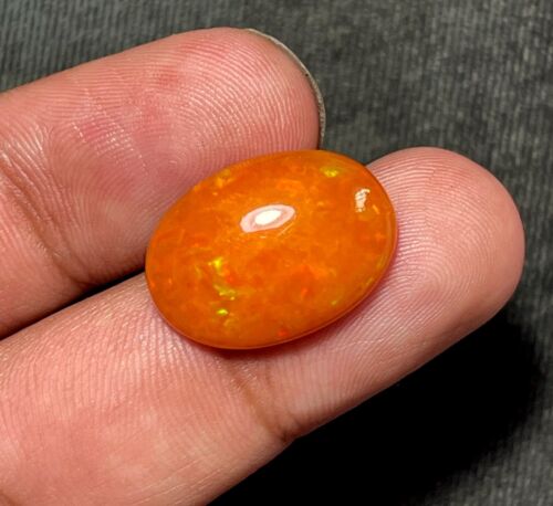 Cabochon opale arancione etiope naturale 19x14 mm fuoco appariscente 7,60 CTS - Foto 1 di 4