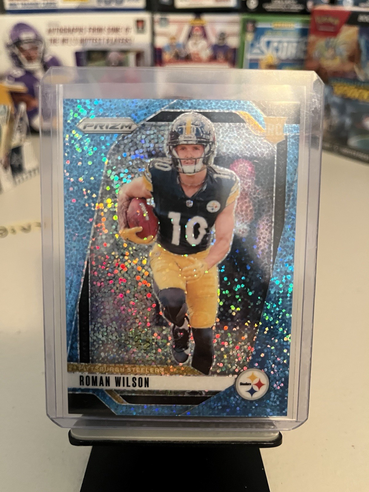 2024 Panini Prizm - Rookies Roman Wilson #384 Blue Sparkle Prizm /96 (RC)