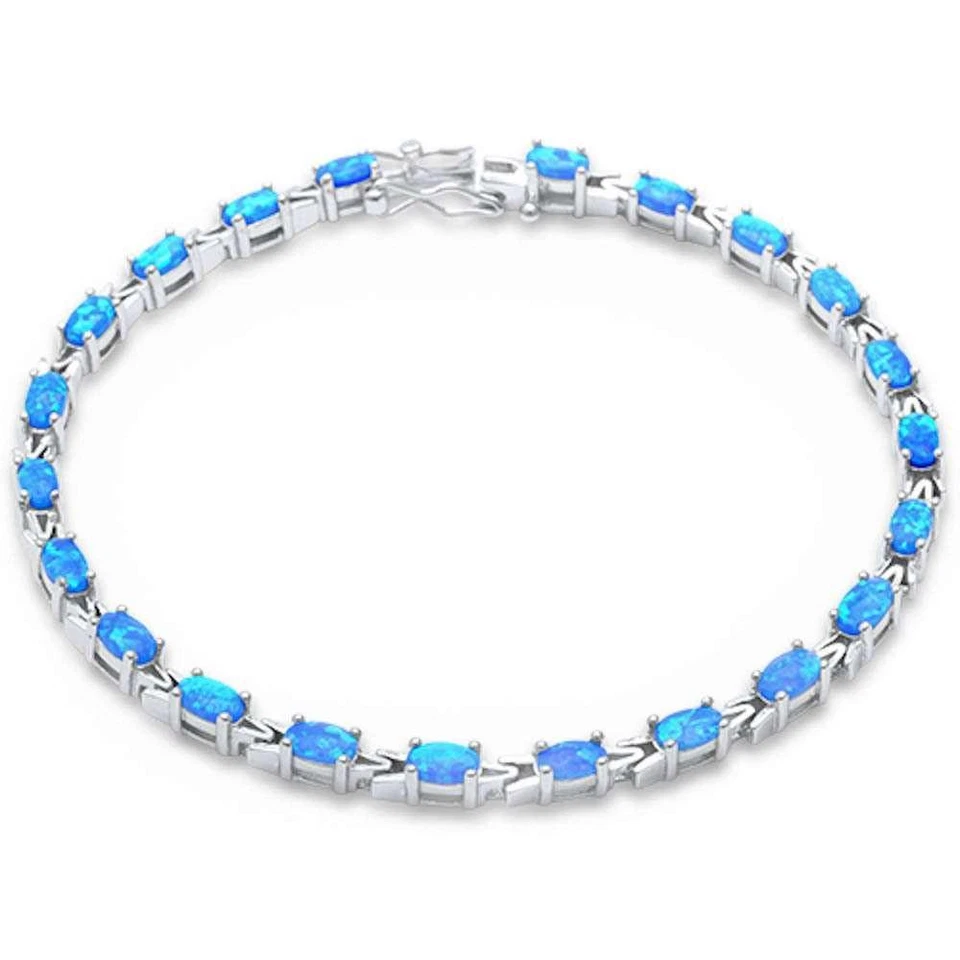 Brazalete de plata de ley 0,925 ópalo azul ovalado de 7,5" Foto 2 de 2