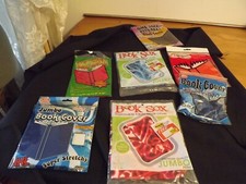 bookcovers - lot of 7 NEW STRETCHABLE BOOK COVERS assorted sizes NIP