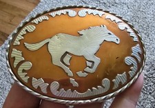 Vintage oval galloping horse belt buckle- orange filigree silver tone rope frame