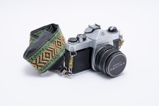 Asahi Pentax Spotmatic SP1000 35mm film camera with SMC Takumar 55mm f/2 lens.