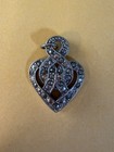 vintage marcasite heart pendant infinity love knot motif integrated into a heart — photo 1