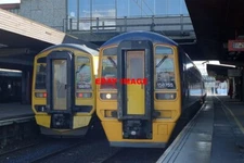 PHOTO  CLASS 158  158751 AND 158755 AT STAFFORD ON 04/03/00.