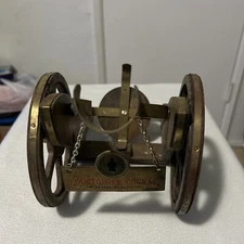 COURVOISIER COGNAC CANNON SHAPED BOTTLE HOLDER, THE BRANDY OF NAPOLEAN