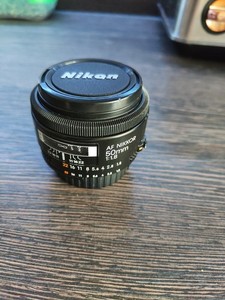 Nikon NIKKOR 50MM AF f/1.8 prime lens, excellent condition.