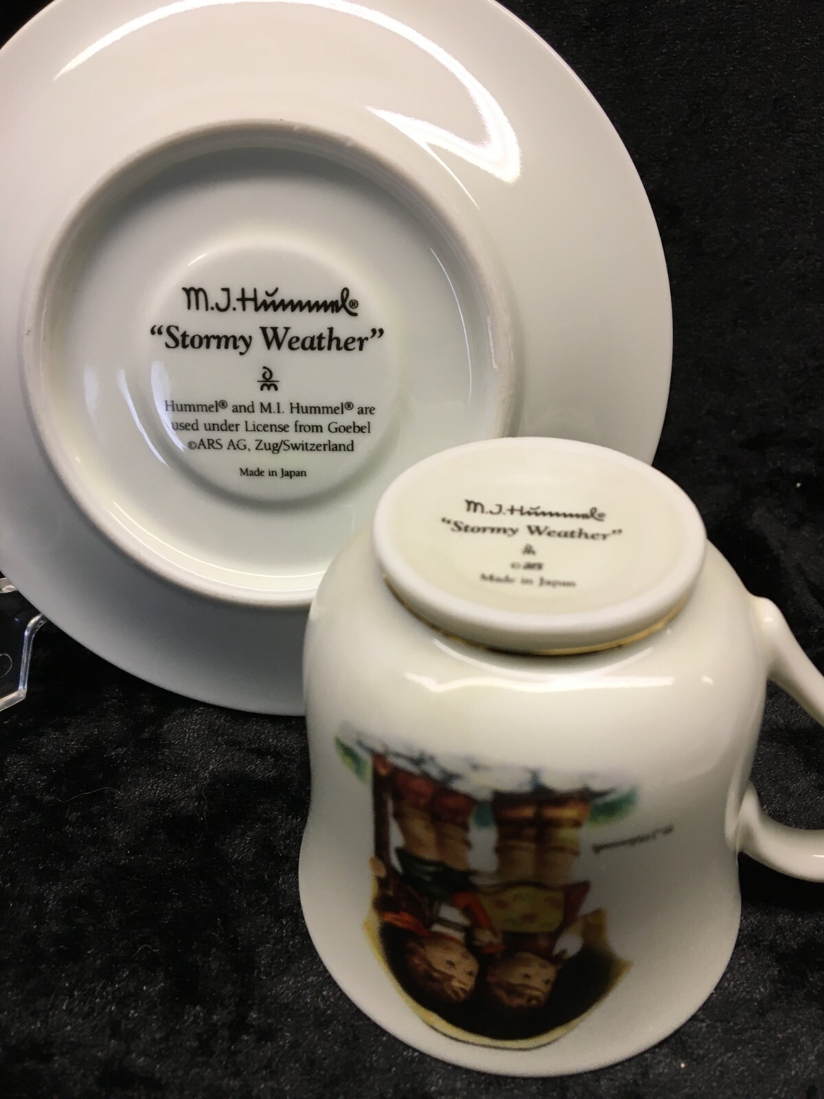 M.J. Hummel Tea Cup & Saucer STORMY WEATHER