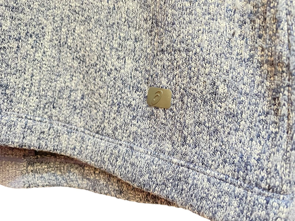 Pullover deportivo con aberturas para pulgar Asics de cuello alto de manga larga forrado de lana para mujer Foto 3 de 4