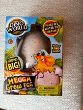 DINO WORLD Megga Grow Egg Place in Water To Watch it Hatch Dinosaur NIB
