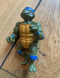 1980's teenage mutant ninja turtles action figures