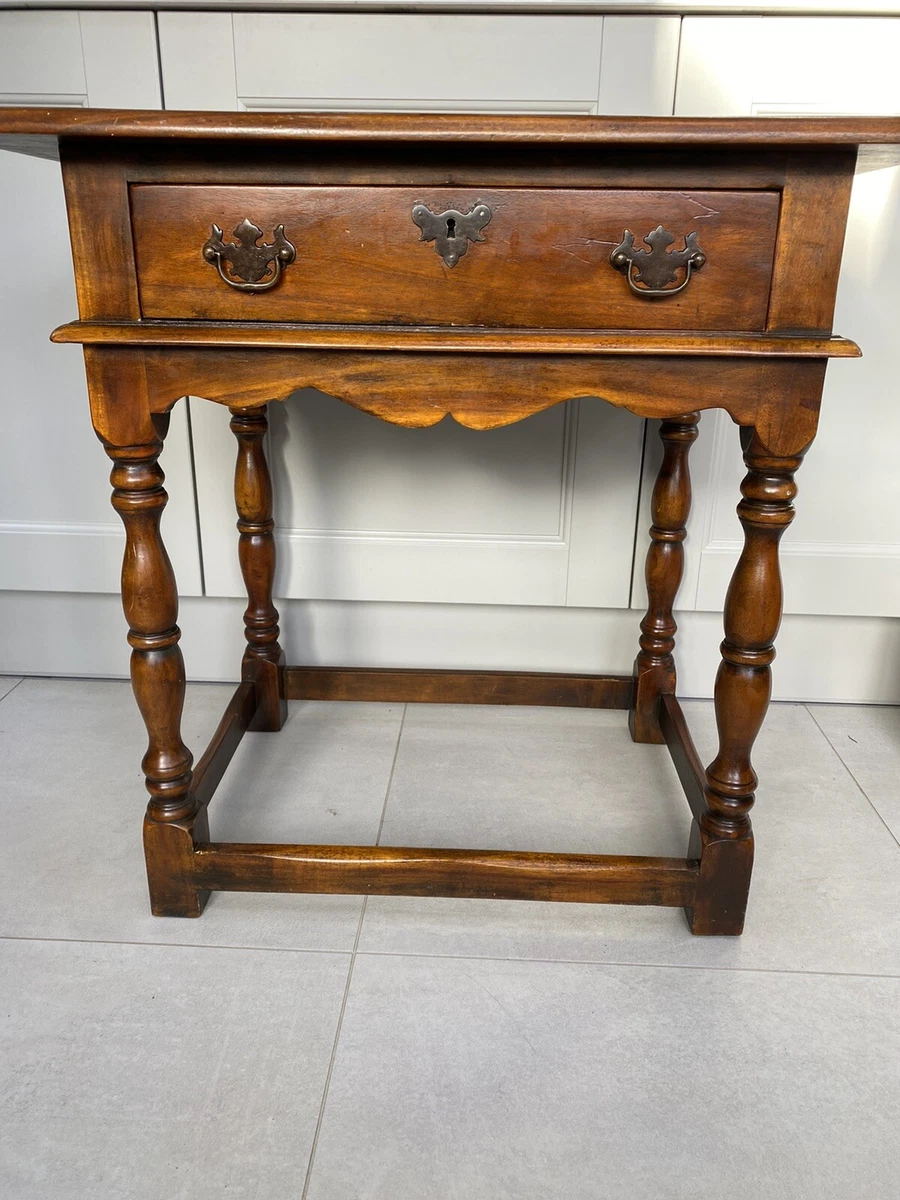 Mahogany end table with drawer outlet