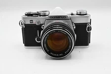 Olympus OM-1 OM-1n M-1 in Chrome or Black w/ optional 50mm f/1.4 camera kit