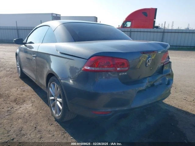 TAN RIGHT FRONT DOOR TRIM PANEL 2008 VOLKSWAGEN EOS Foto 4 de 4