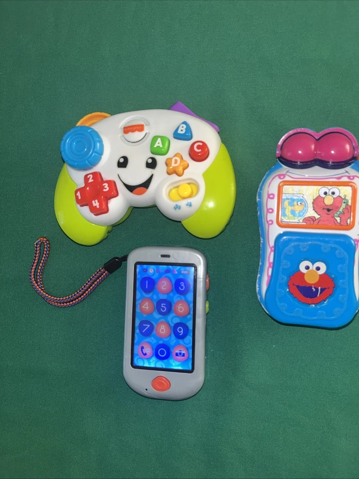 Juguetes telefónicos Sesame Street Elmo + B. Juguetes Teléfono Prentend y FP Control Remoto C. Foto 4 de 4