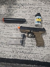 Airsoft Pistol With 1 Container With 400 BBs  2 Clips And A Supreser.