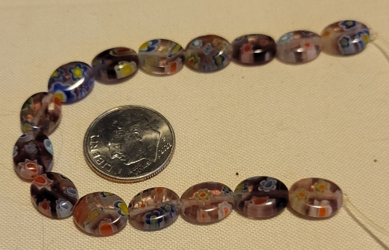 L812 10mm millefiore glass oval beads. will combine to save on shipping 