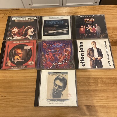 Lot Of 7 Compact Discs 1970s 1980s Elton John ELO Creedence Santana Read Below