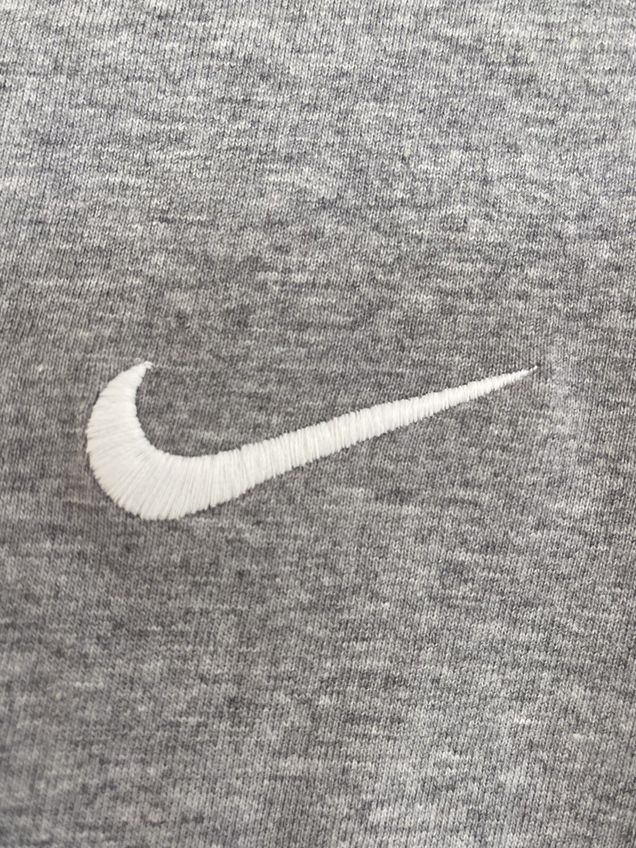 nike top with tick in middle