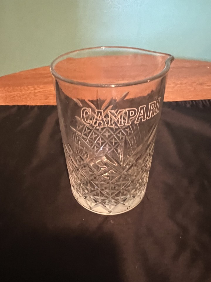 A vintage Campari mixing glass — instantly recognizable Italian aperitivo branding on a piece of actual bar history.