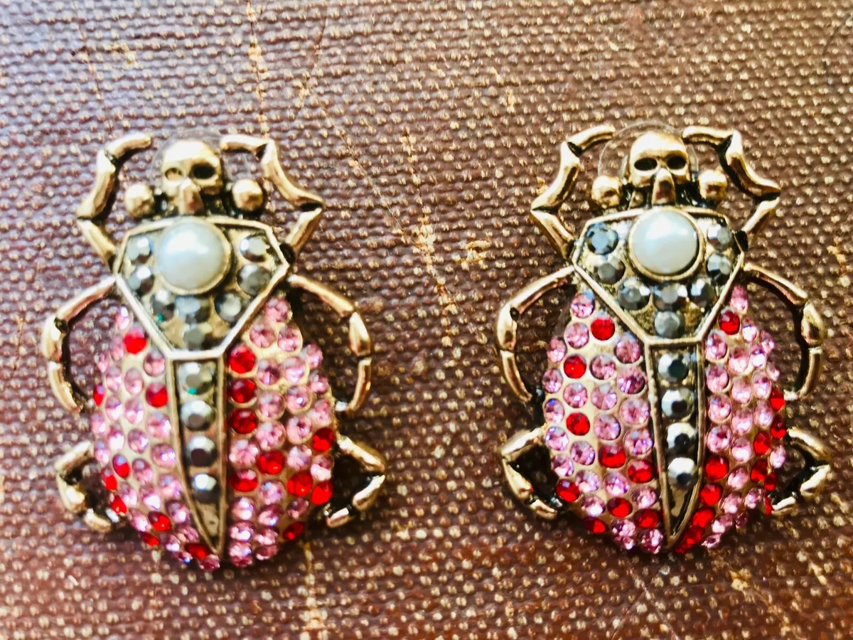 Designer best sale skull earrings