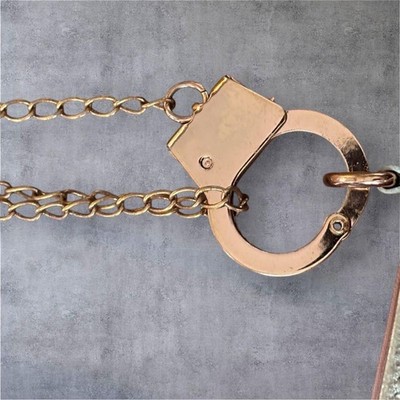 CUFFZ BY LINZ Handcuff Mini Shoulder Bag Gold Leather Pink