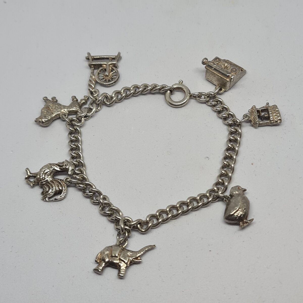 Vintage Delma Charm Bracelet 1950s Lifestyles 6 Dangle Charms 7 inch Silver  Tone | eBay