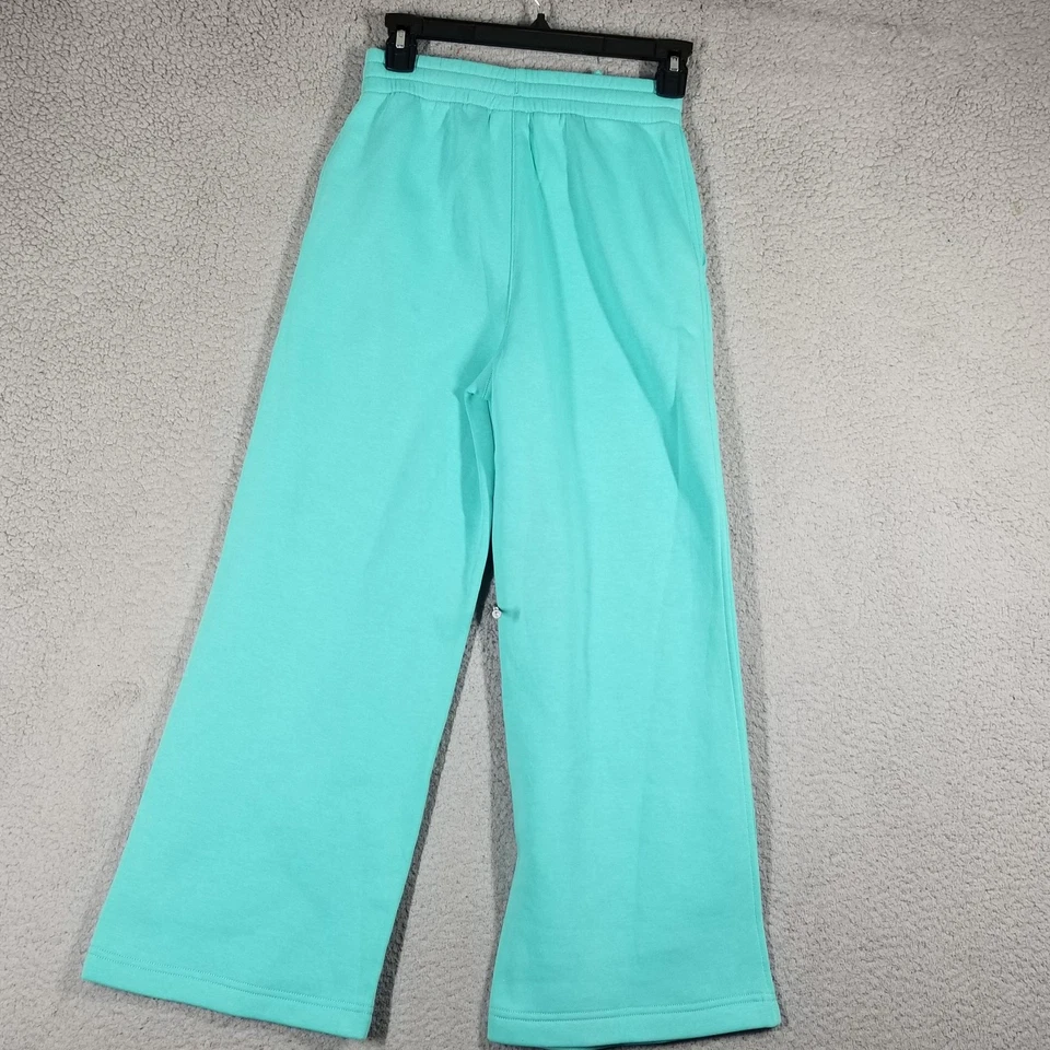 Pantalones deportivos Nike Sportswear Club polar para niñas de pierna ancha FZ6774 para jóvenes Foto 2 de 4