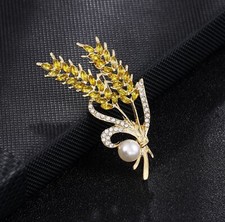 Broche bijou épingle épi de blé et perle nacrée en acier.