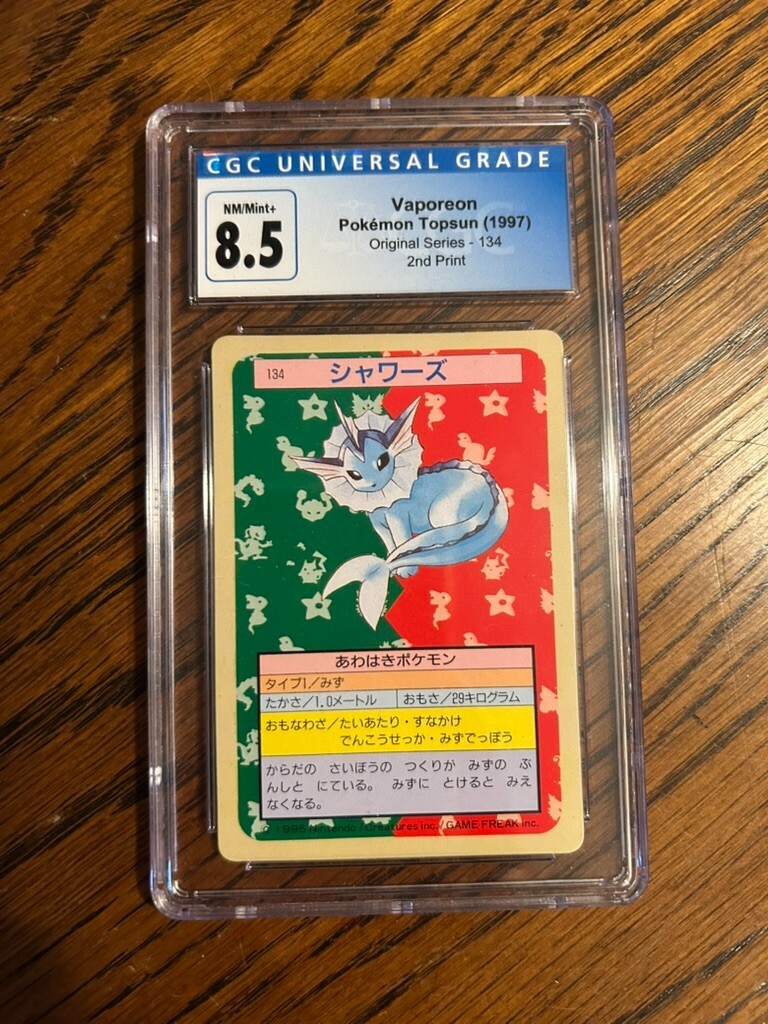 1997 Pokemon Japanese Topsun Blue Back 1st Print Vaporeon #134 CGC 8.5 NM/MT+