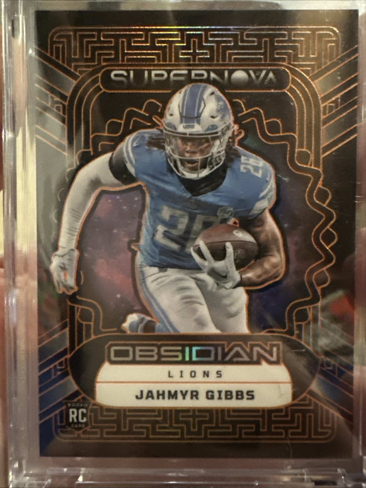 2023 Panini Obsidian Supernova Jahmyr Gibbs #12 Orange Electric Etch 37/65 (RC)