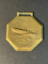 Pressed Tin  Watch Fob With Racing Boat Nautical Scene