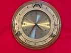 Brass porthole clock on oak frame  battery-operated heavy incl second sweep hand — photo 1