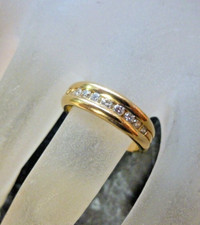 Bague jonc or 18K  sertie de 9 diamants H-VVS ( 0,27ct)  poincon  aigle  T 54