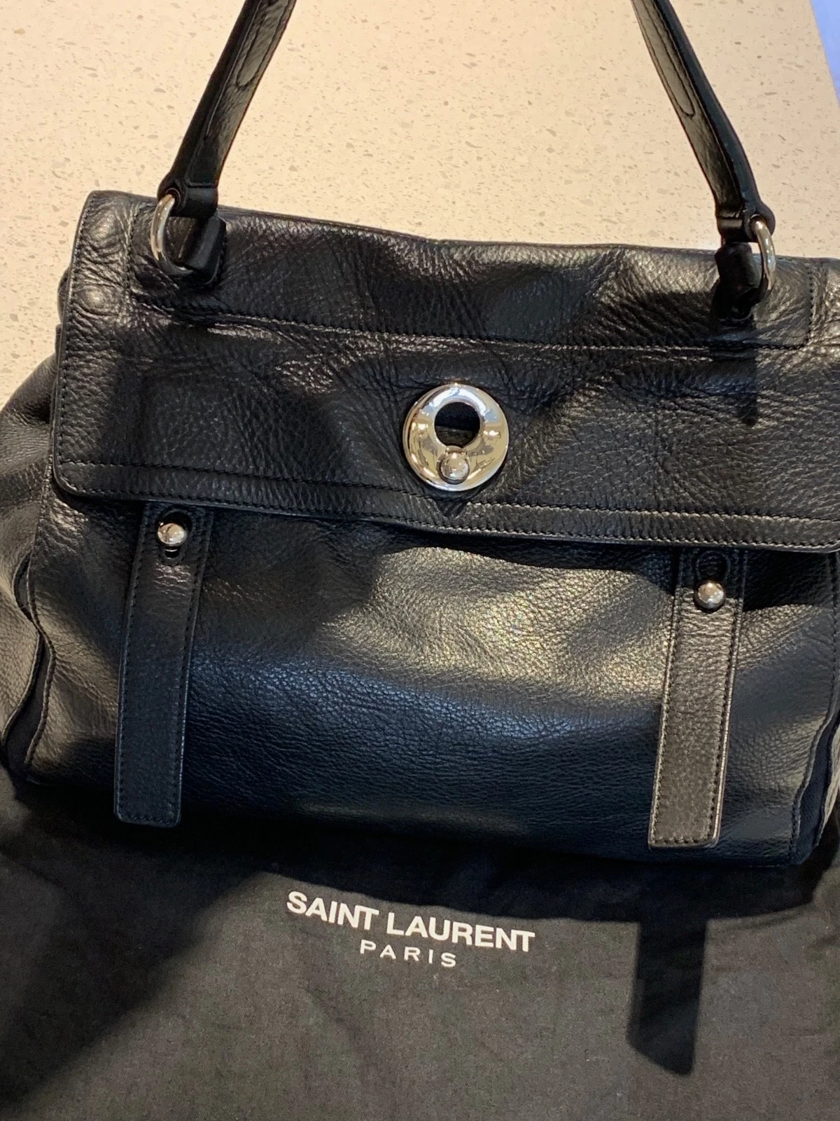Saint Laurent — YVES SAINT LAURENT Signature Black Leather Top Handle Bag