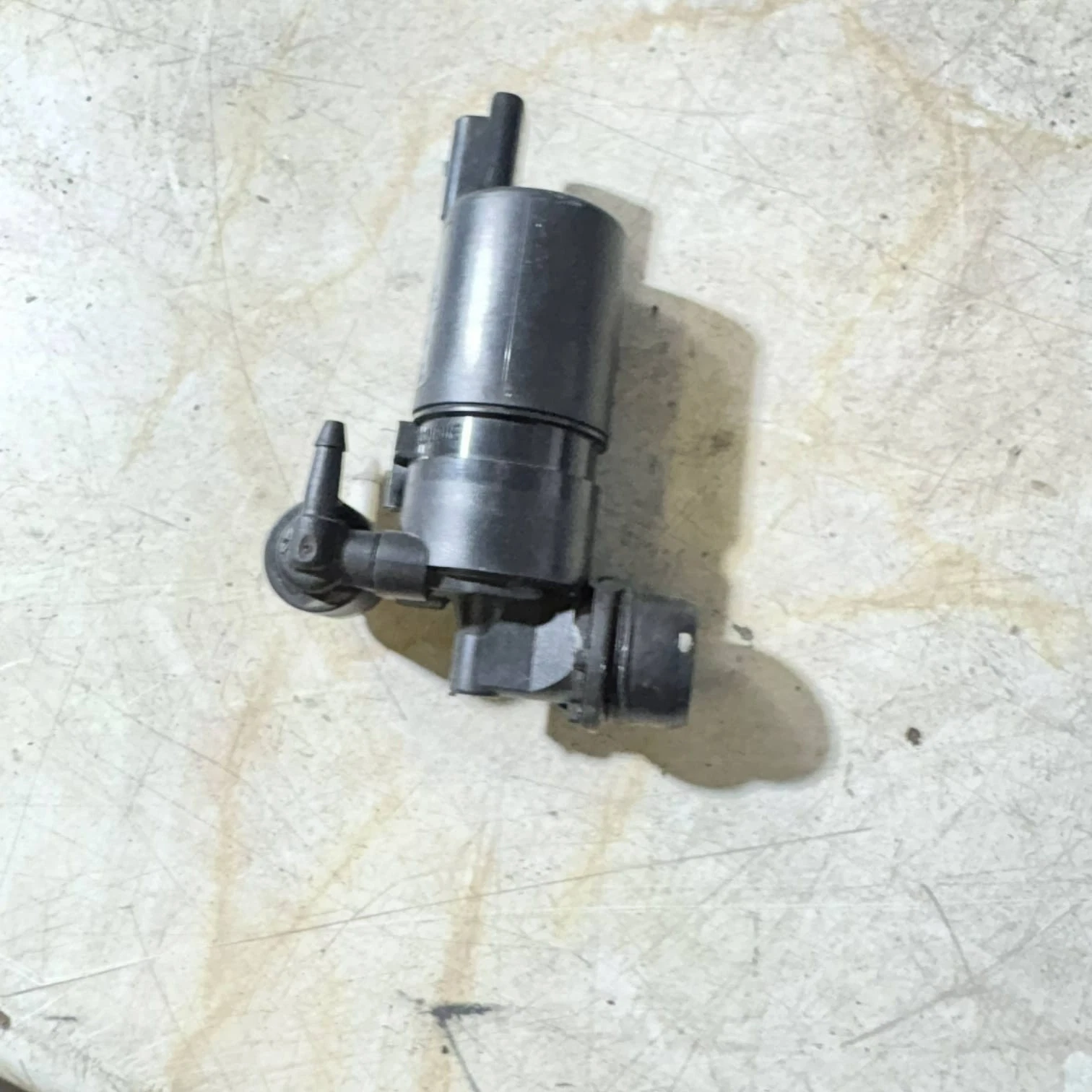 Actual washer pump front view 286203634R