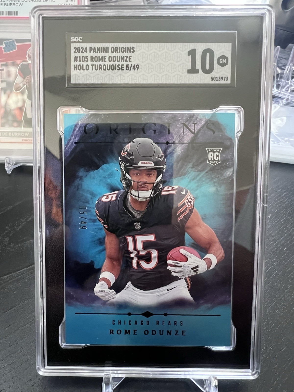 2024 Panini Origins - Rookies Rome Odunze #105 Holo Turquoise /49 (RC)