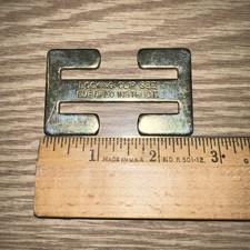 Car seatbelt locking clip originally from child carseat 